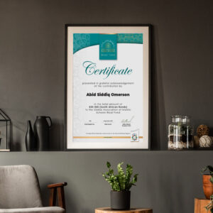 Framed GAIS Digital Waqf Certificate displayed on a shelf
